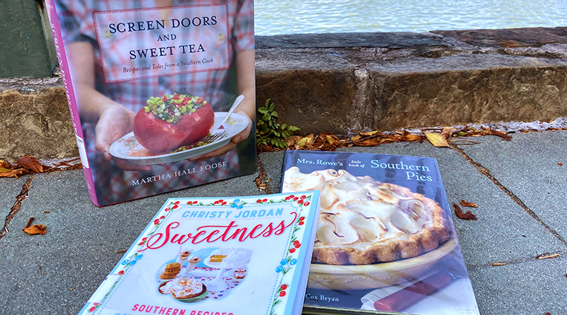 Photo of three southern cookbooks for people to choose recipes from: Screen Doors and Sweet Tea, Sweetness, and Mrs. Rowe's Little Book of Southern Pies